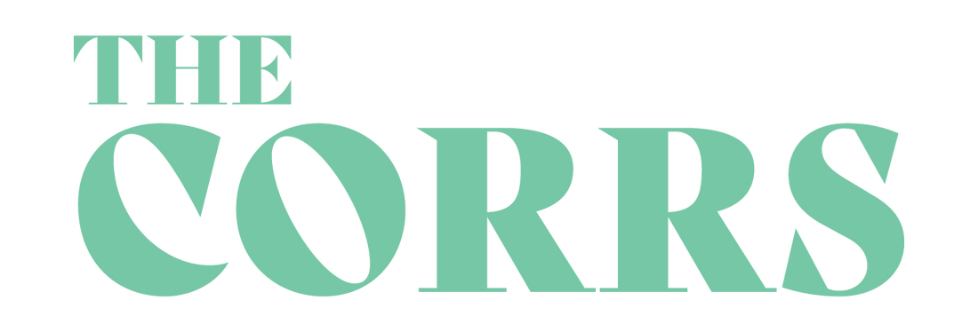 Logo image with the text “THE CORRS” in light green. 